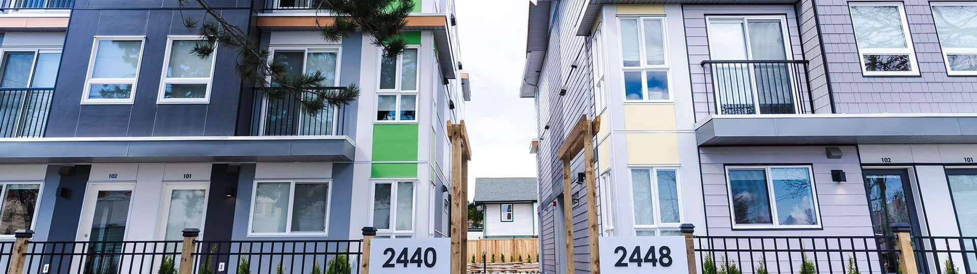 Exterior of two modern rental buildings